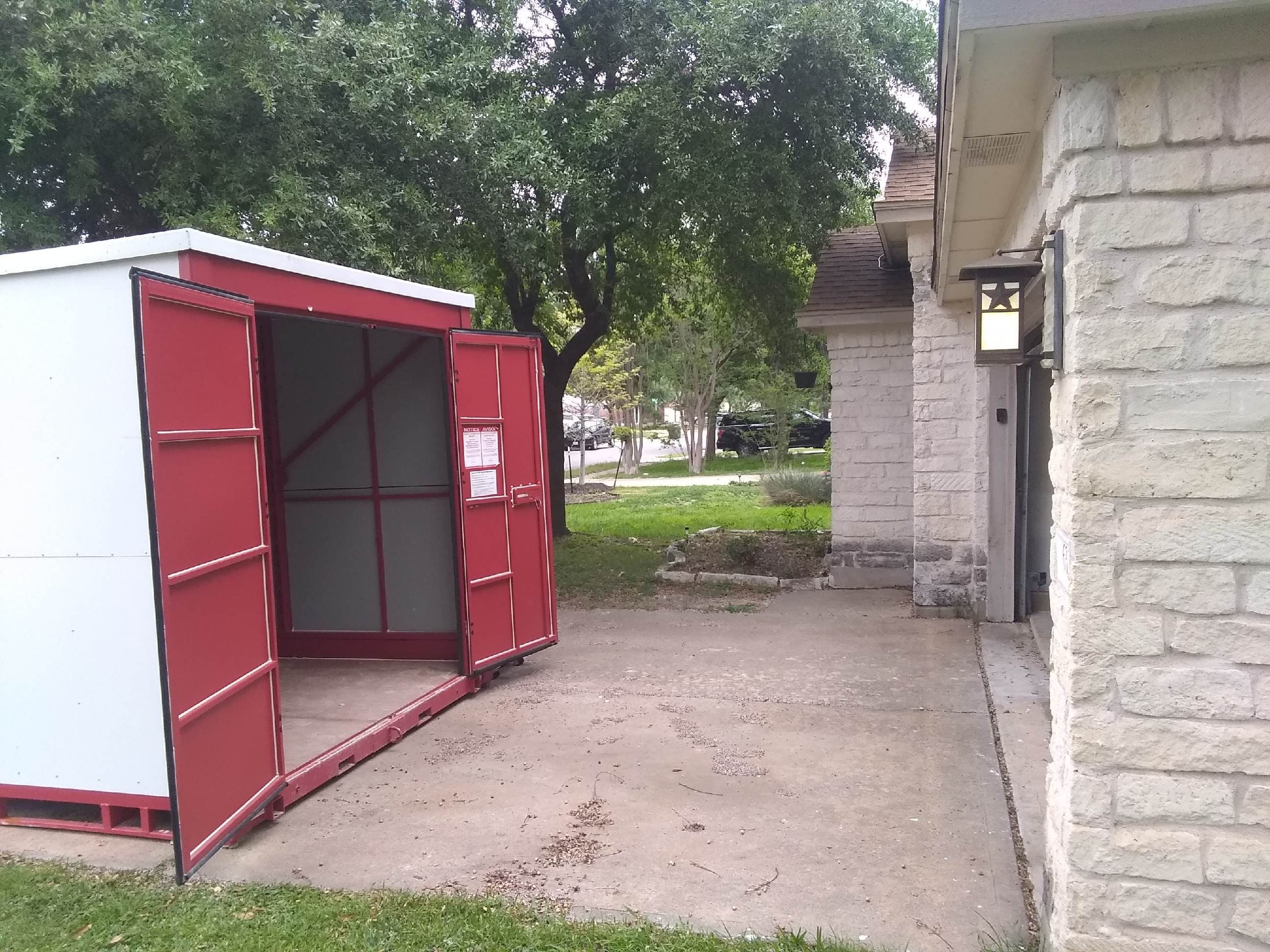 Organized storage unit with labeled moving boxes