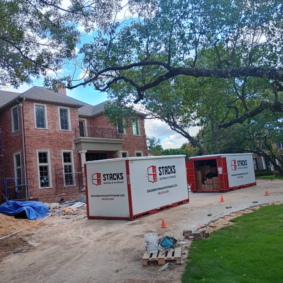Portable storage container being loaded at a home