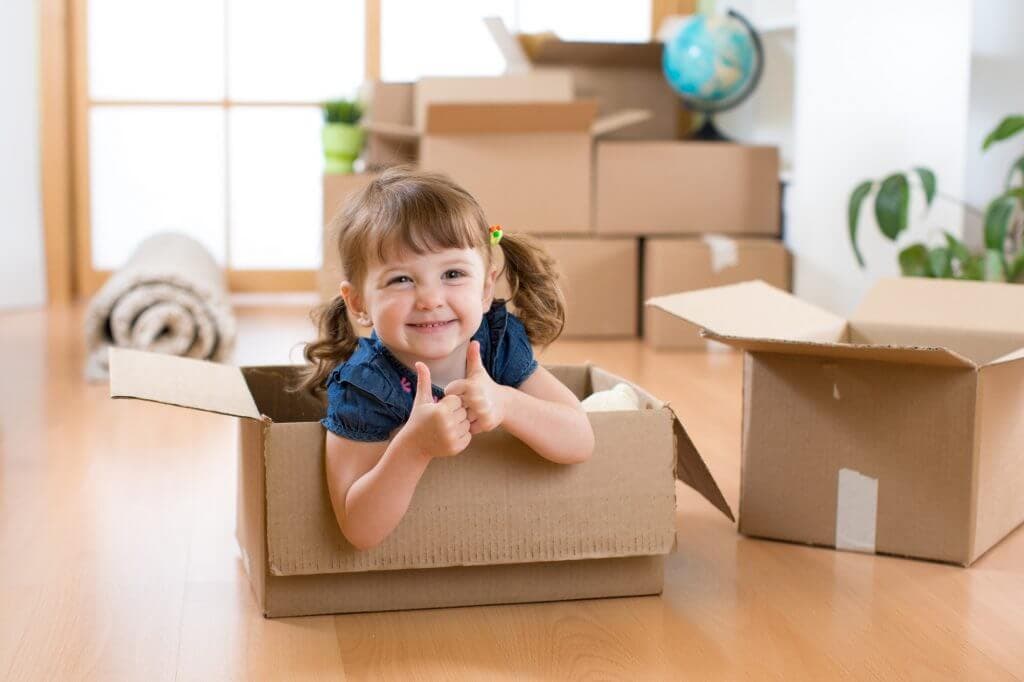 Happy kid showing thumbs up