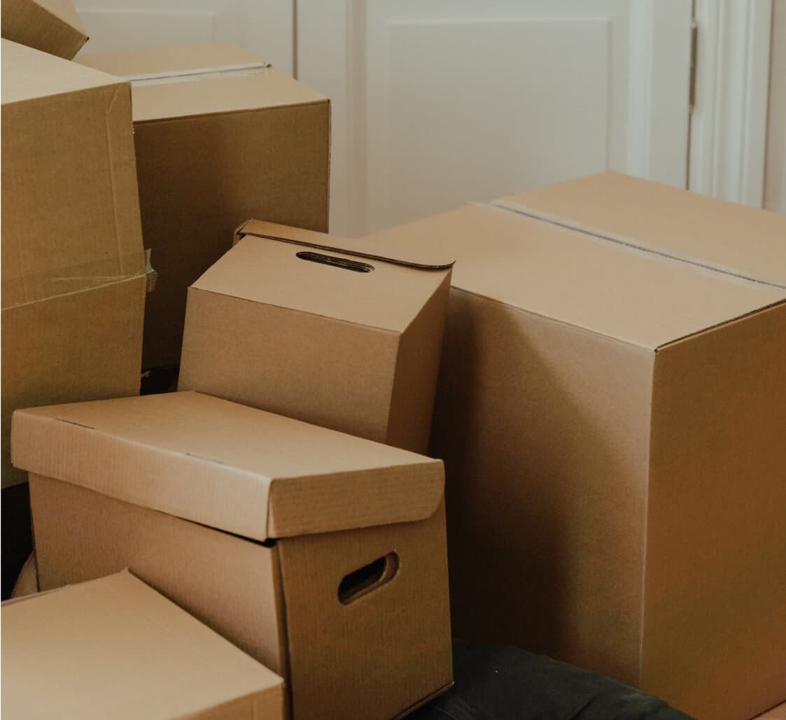 Stacked moving boxes ready for packing
