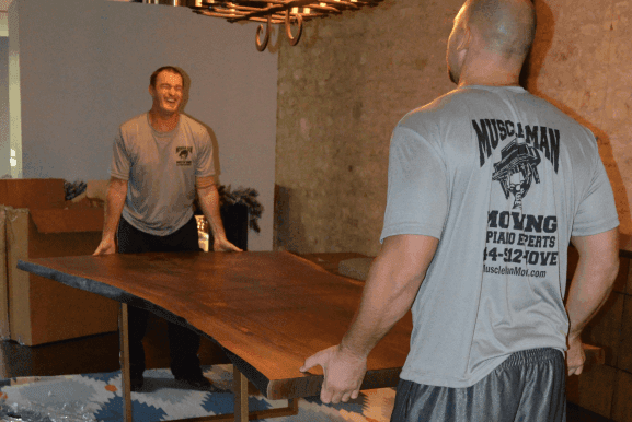 MuscleMan Elite crew moving a table