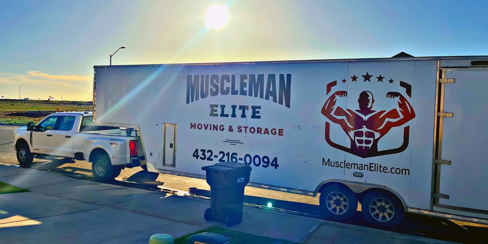 MuscleMan Elite commercial moving truck at a job site