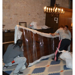 3-movers-packing-piano.png